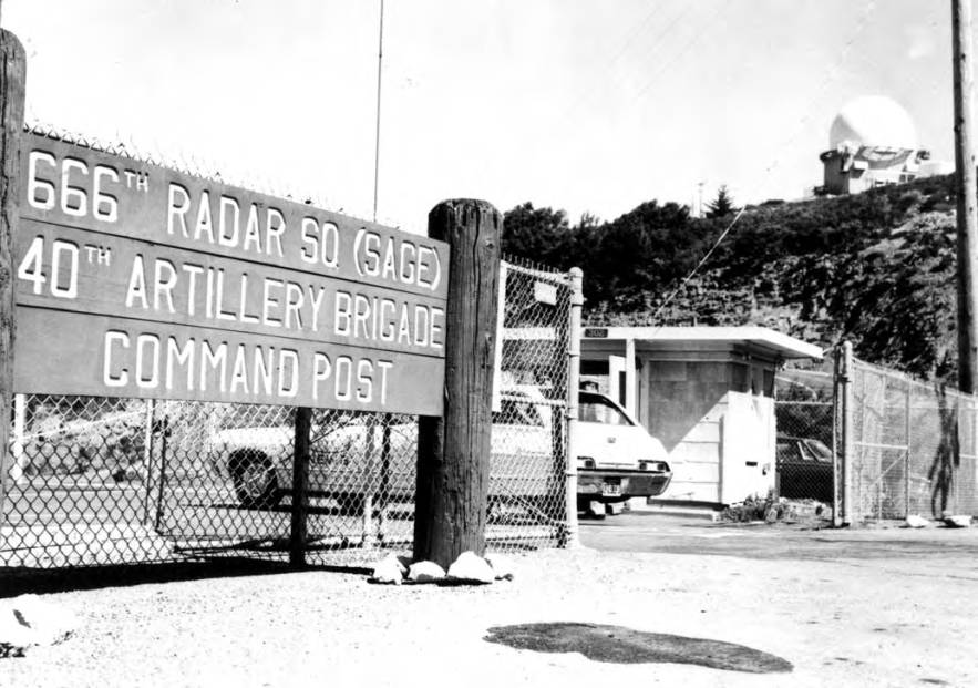 Sign outside gate reads '666th Radar Squadron (SAGE); 40th Artillery Brigade; Command Post'