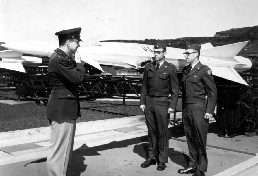 Captain and twin soldiers standing on elevator with Ajax