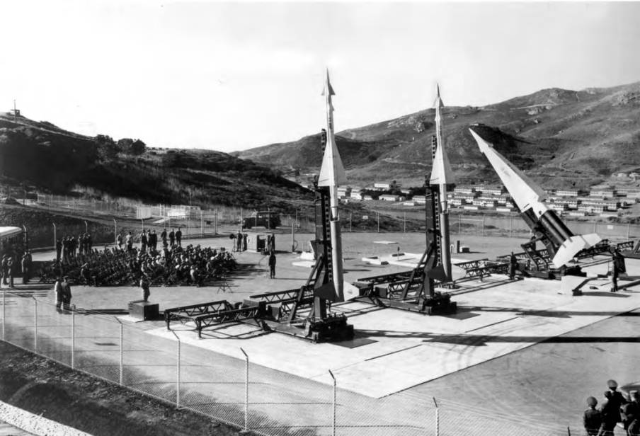 Ceremony at SF88 with audience, two Ajax, and one Hercules on launchers